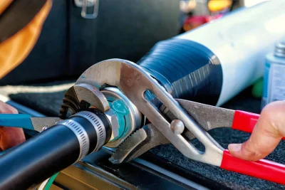 Pipe repair service using professional plumbing tools in Apollo Beach, Florida
